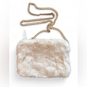 FOREVER 21 cream colored faux fur bag with gold link chain. Bag is clean